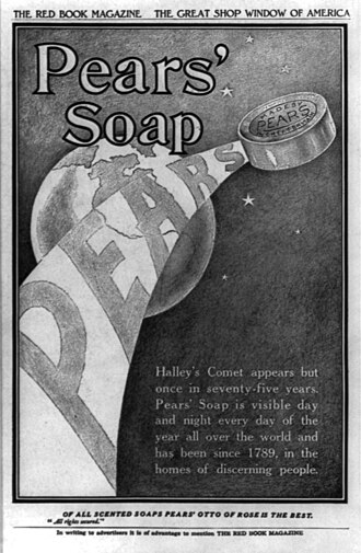 a small rectangular cake of pale soap, edges rounded from use, maker's name pressed into the face